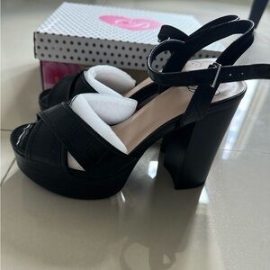 New in box black platform heels